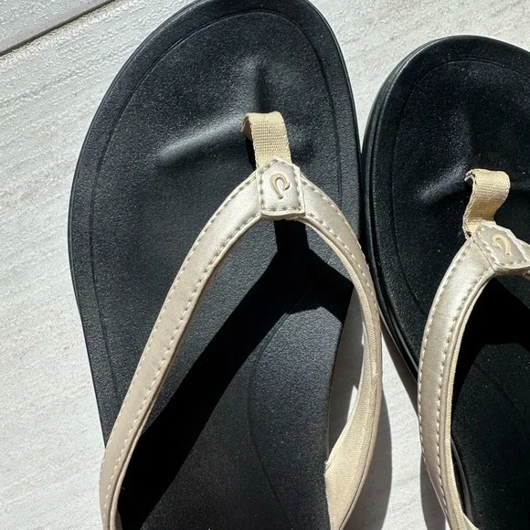 OluKai Women's Black and Gold Flip Flops - Picture 5 of 7